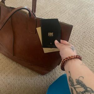 Frye purse. brand new I used it once. Retail price was $330 asking $175 for it.